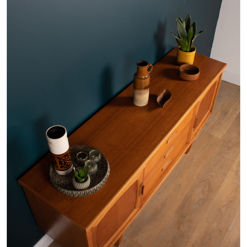 Vintage teak sideboard on sled legs by Jentique, 1960