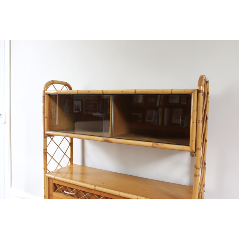 Vintage rattan bookcase by Louis Sognot, 1960