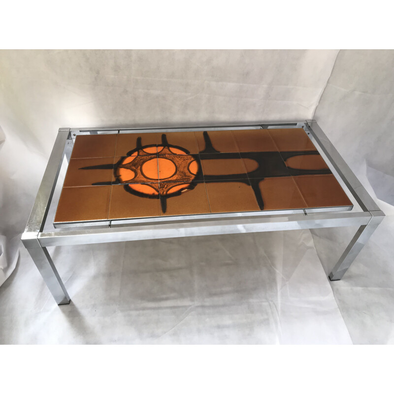 Table basse vintage en métal chromé et céramique