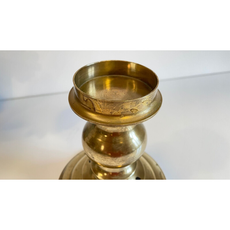 Vintage candle holder in solid brass