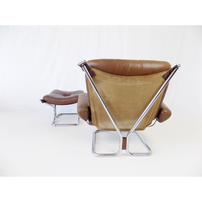 Vintage Westnofa Wingchair leather armchair with ottoman by Harald Relling