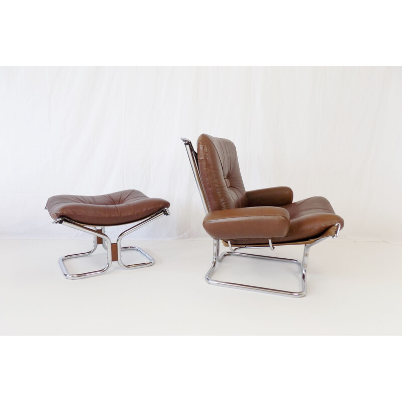 Vintage Westnofa Wingchair leather armchair with ottoman by Harald Relling