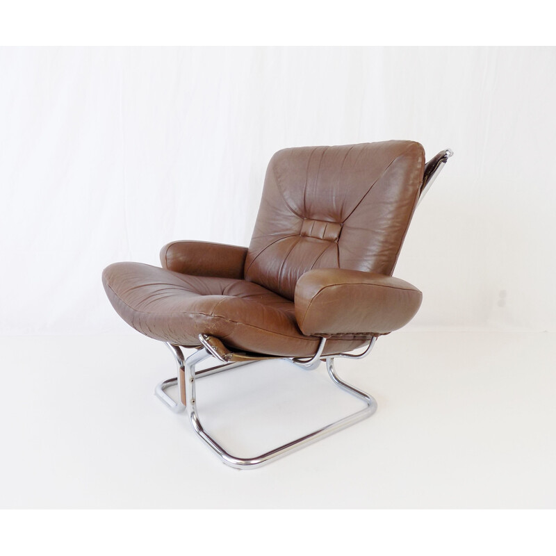 Vintage Westnofa Wingchair leather armchair with ottoman by Harald Relling