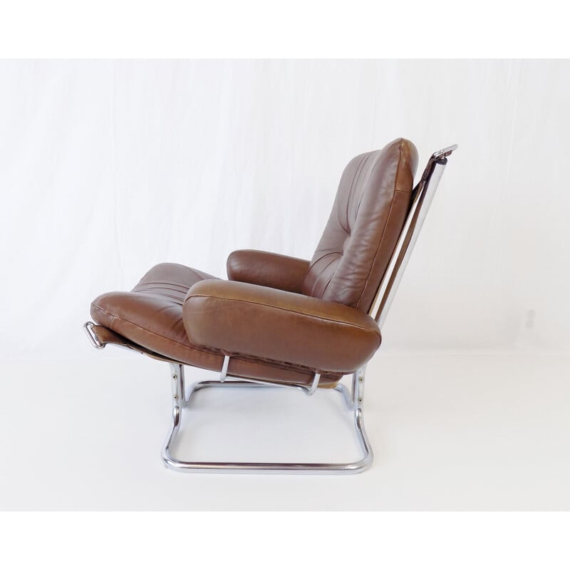 Vintage Westnofa Wingchair leather armchair with ottoman by Harald Relling