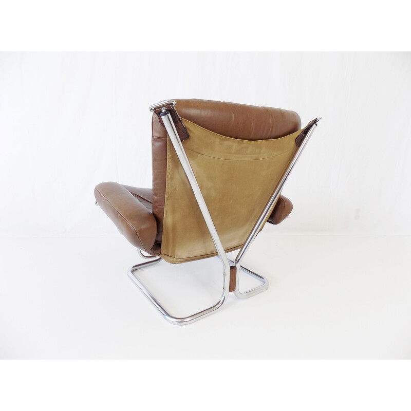 Vintage Westnofa Wingchair leather armchair with ottoman by Harald Relling