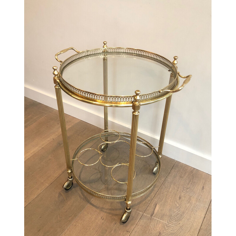 Vintage round rolling side table in brass, France 1950