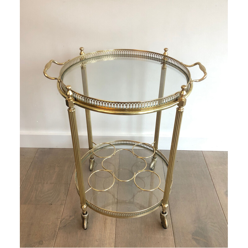 Vintage round rolling side table in brass, France 1950