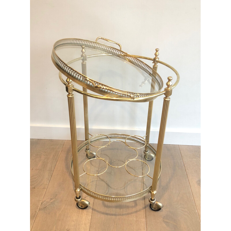 Vintage round rolling side table in brass, France 1950