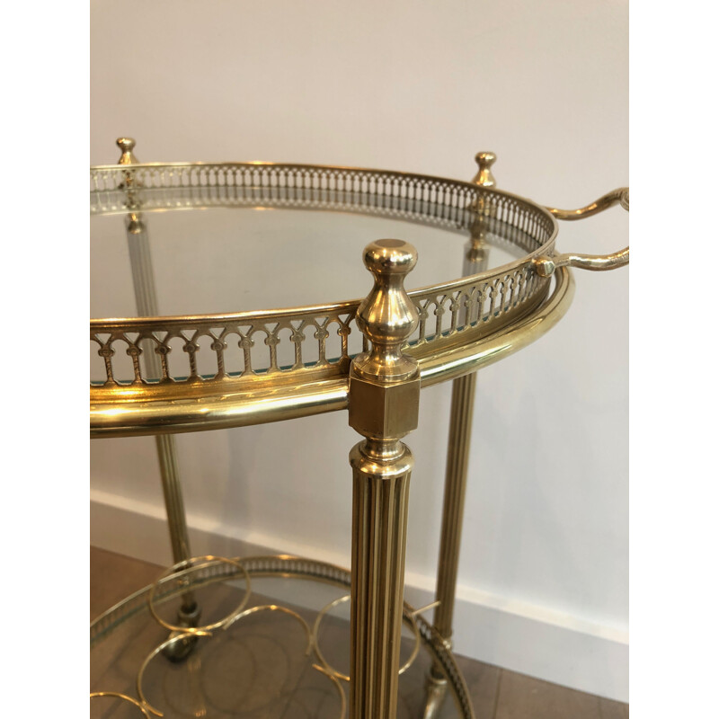 Vintage round rolling side table in brass, France 1950
