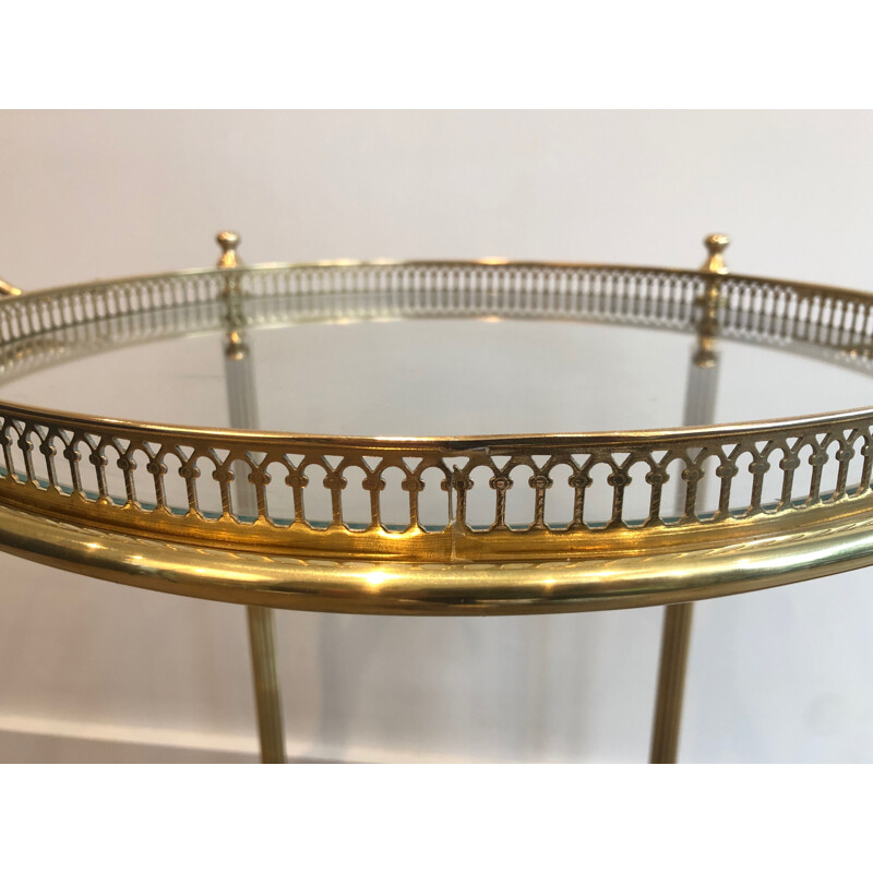 Vintage round rolling side table in brass, France 1950