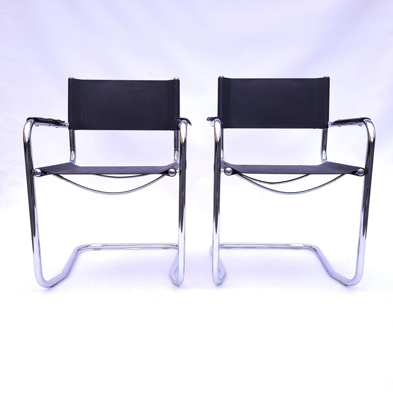 Pair of vintage chairs in chrome and leather, Italy 1980