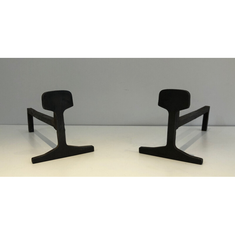 Pair of vintage modernist andirons in cast iron and wrought iron, France 1950