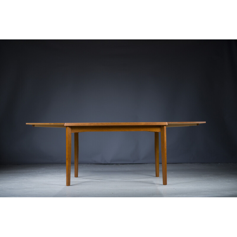 Mid-century Danish teak dining table by Henning Kjaernulf, 1970s