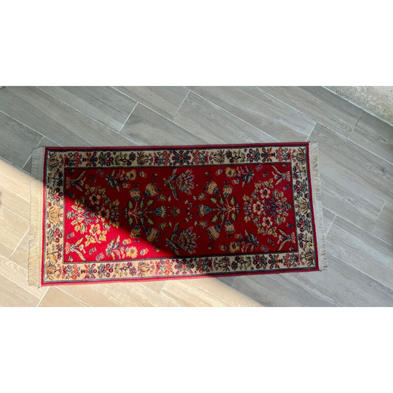Vintage Persian rug in red wool