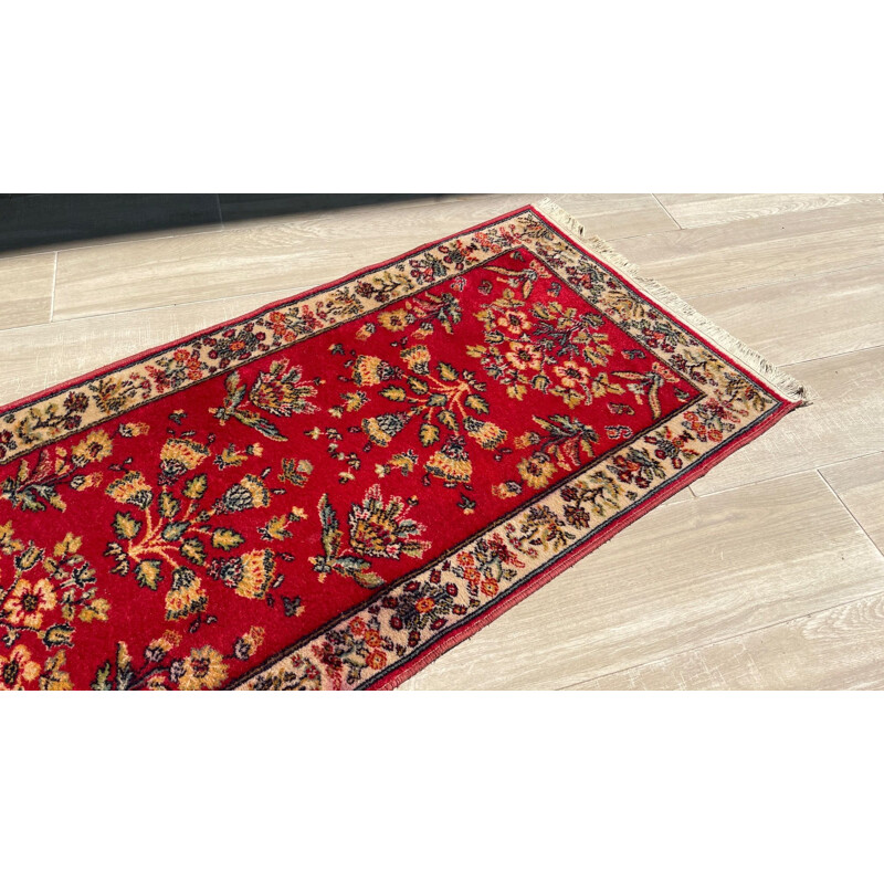 Vintage Persian rug in red wool