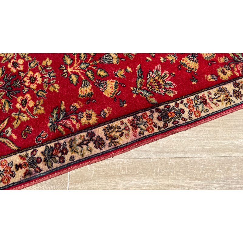 Vintage Persian rug in red wool