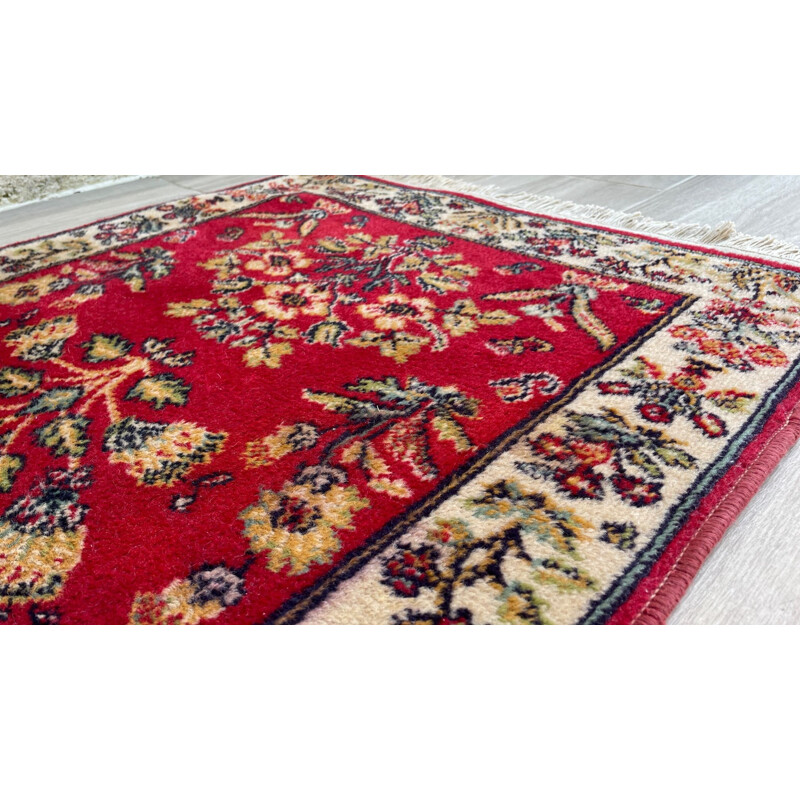 Vintage Persian rug in red wool