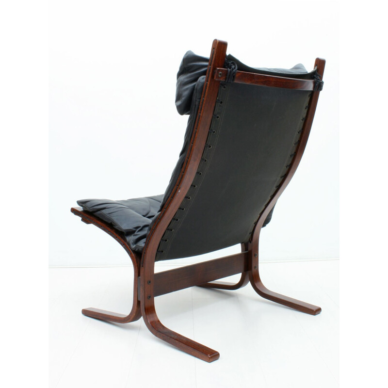 Westnofa "Siesta" armchair with its ottoman in plywood and leather, Ingmar RELLING - 1960s