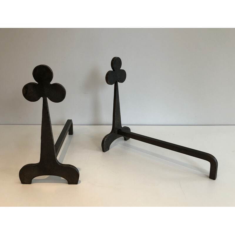 Pair of vintage steel and wrought iron andirons with shamrock decorations, France 1950