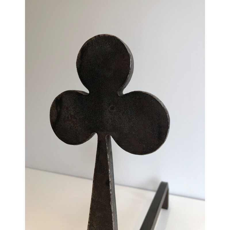 Pair of vintage steel and wrought iron andirons with shamrock decorations, France 1950