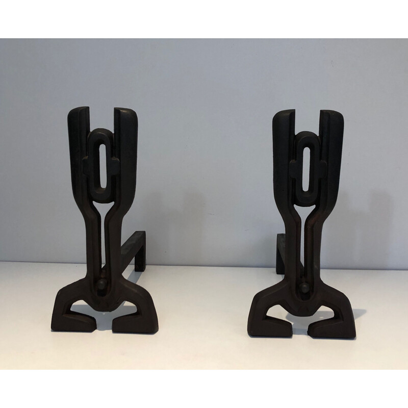 Pair of vintage modernist andirons in cast iron and wrought iron, France 1970