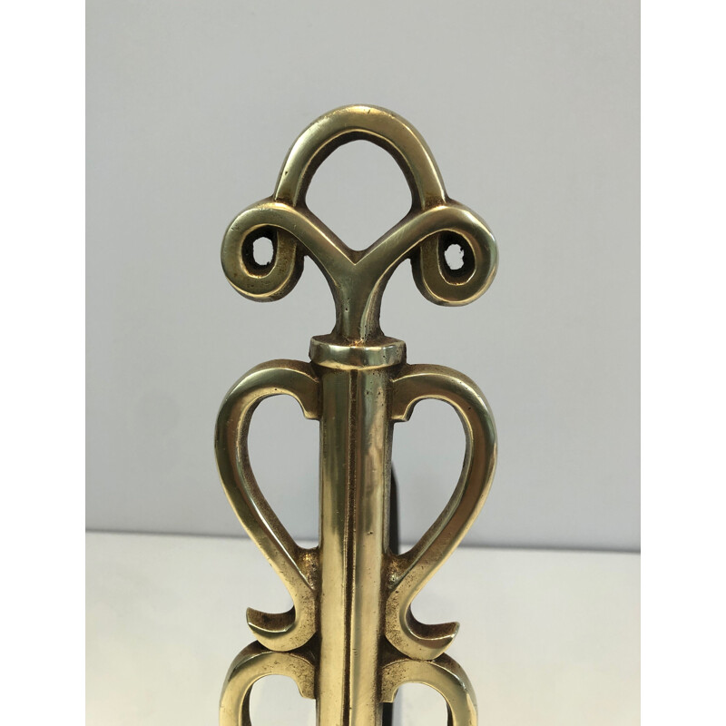 Pair of vintage brass and wrought iron andirons by Raymond Subes, France 1940