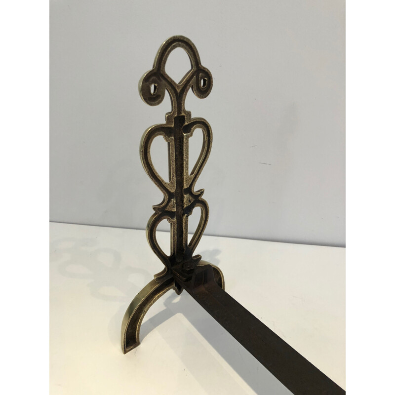 Pair of vintage brass and wrought iron andirons by Raymond Subes, France 1940