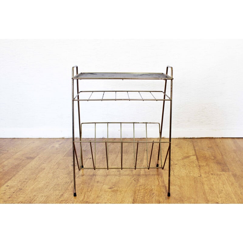 Vintage magazine rack in black perforated metal