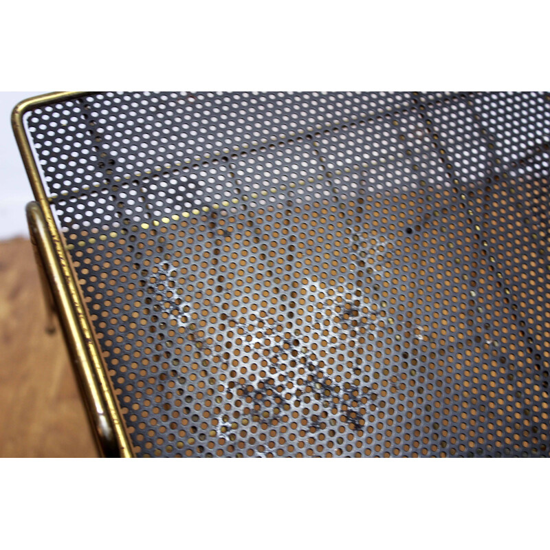 Vintage magazine rack in black perforated metal