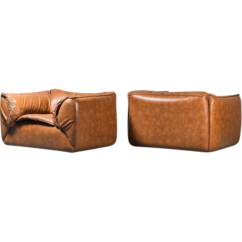 Paire de fauteuils vintage en cuir brun et bois, 1970
