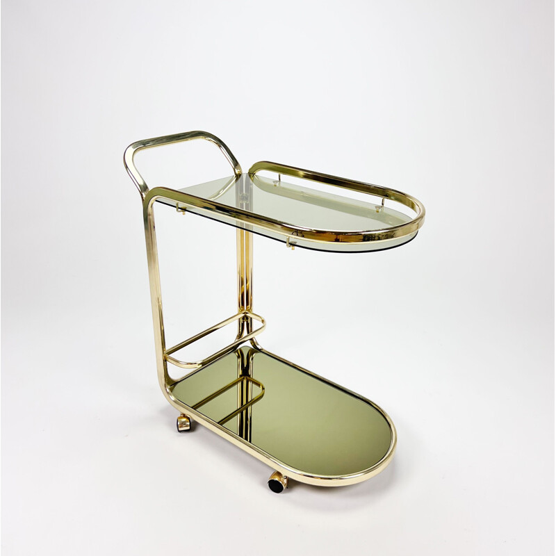 Vintage Hollywood Regency bar cart in brass and smoked glass, 1970