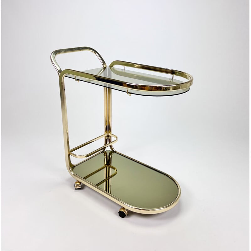 Vintage Hollywood Regency bar cart in brass and smoked glass, 1970