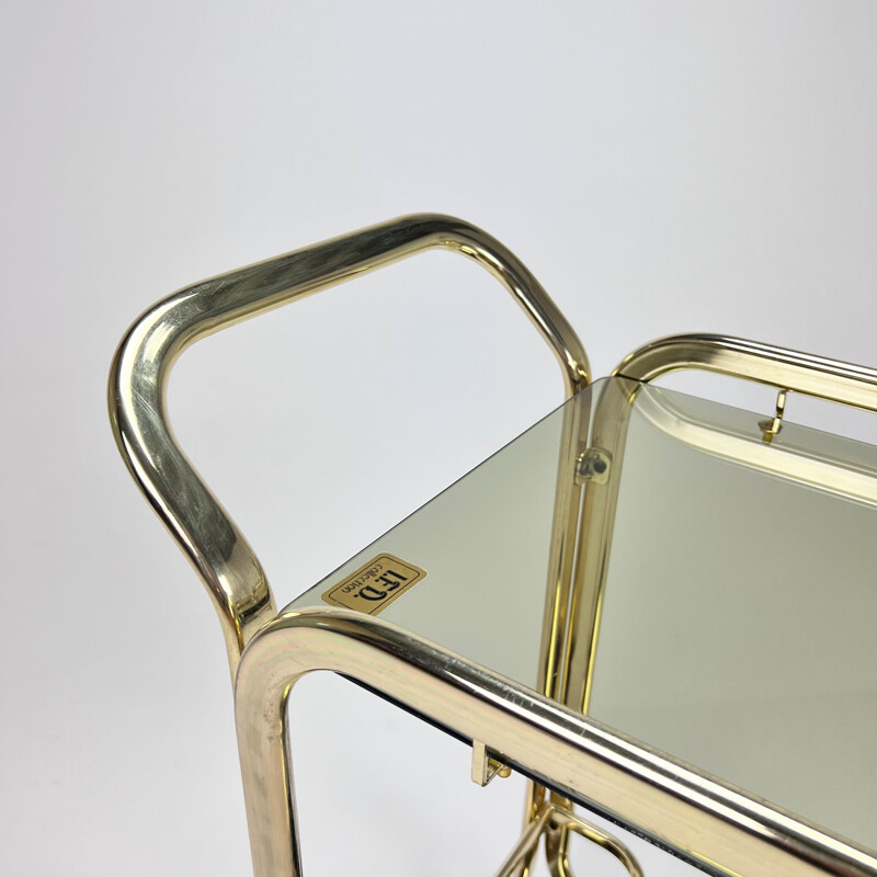 Vintage Hollywood Regency bar cart in brass and smoked glass, 1970