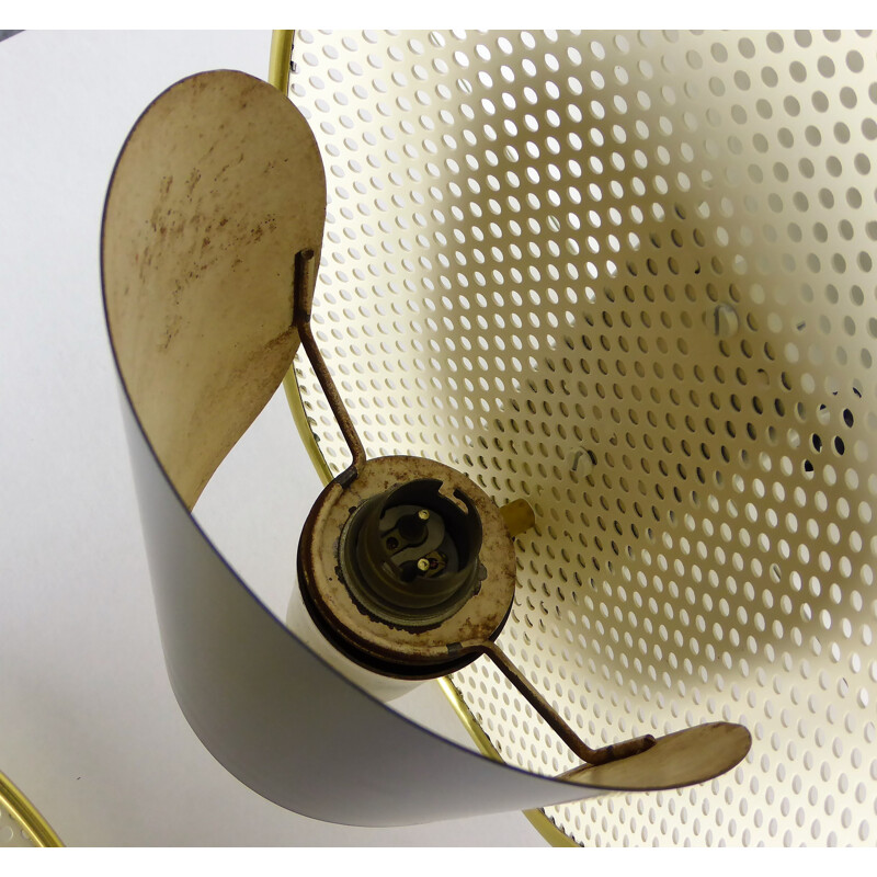 Pair of perforated metal and brass wall lights, Jacques BINY - 1950s