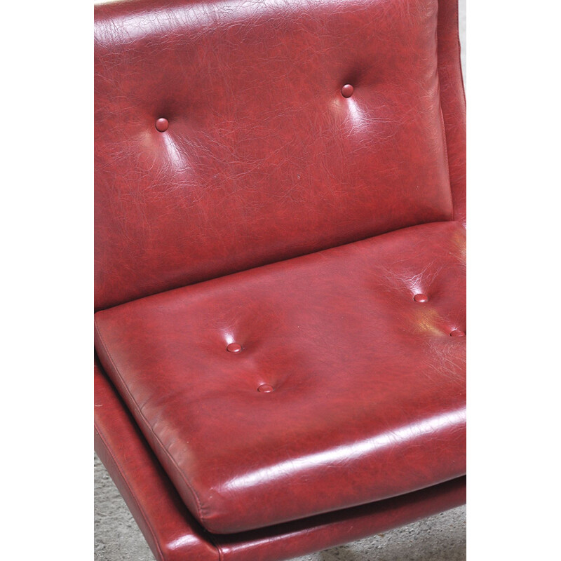 Sillón francés de época en cuero rojo y acero inoxidable de Raphael Raffel, 1970