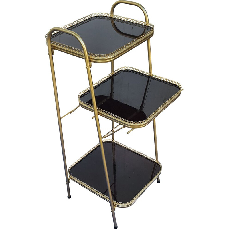 Vintage shelf in gold metal