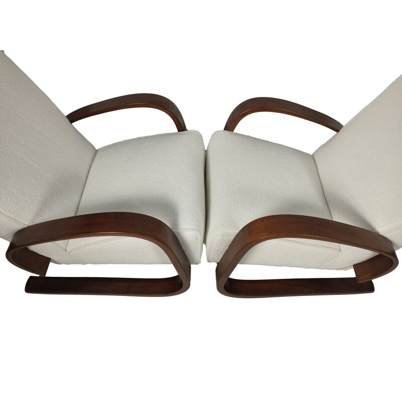 Pair of vintage cantilever boucle armchairs by Miroslav Navrátil for Up Závody, 1940s