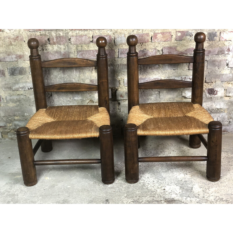 Pair of vintage oak straw chairs by Charles Dudouyt, 1930