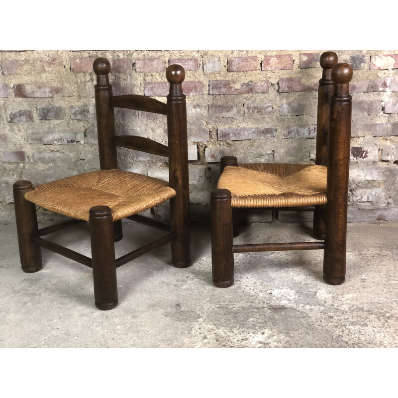 Paire de chaises vintage en chène paillées par Charles Dudouyt, 1930