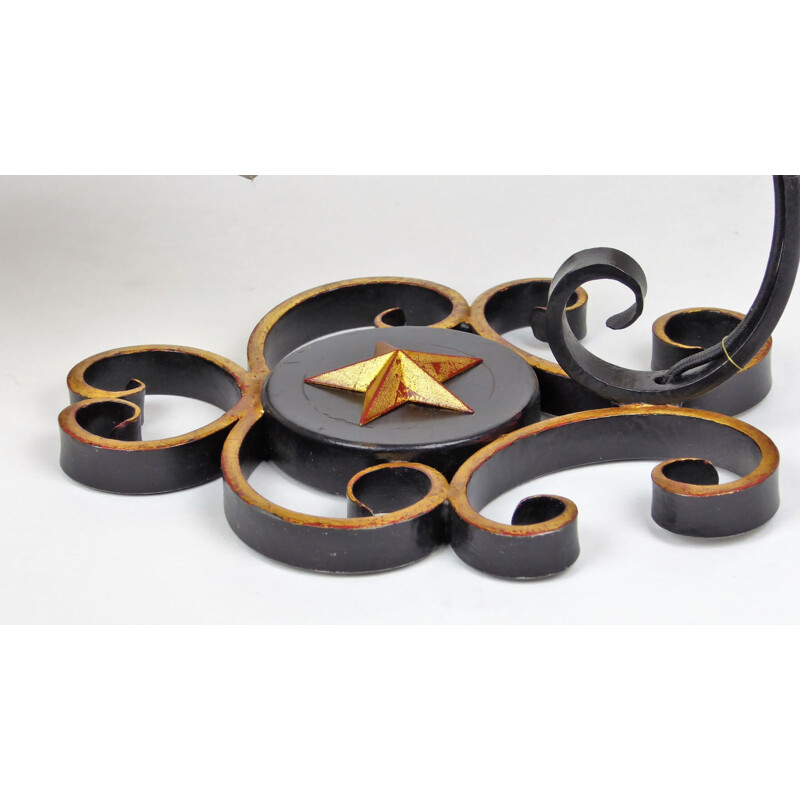 Suite de 4 appliques "Volute" en métal noir à étoile dorée - 1950