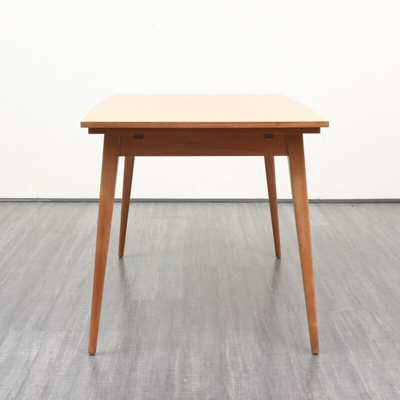 Extendable dining table in walnut - 1960s