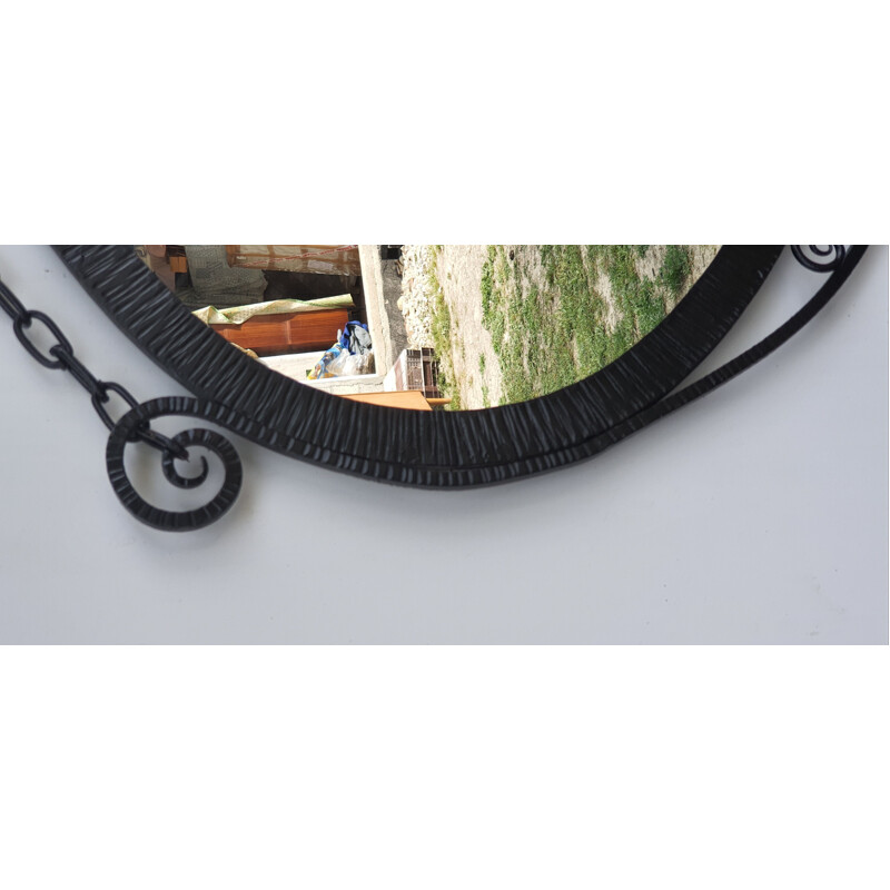 Espejo ovalado art decó vintage de hierro forjado negro