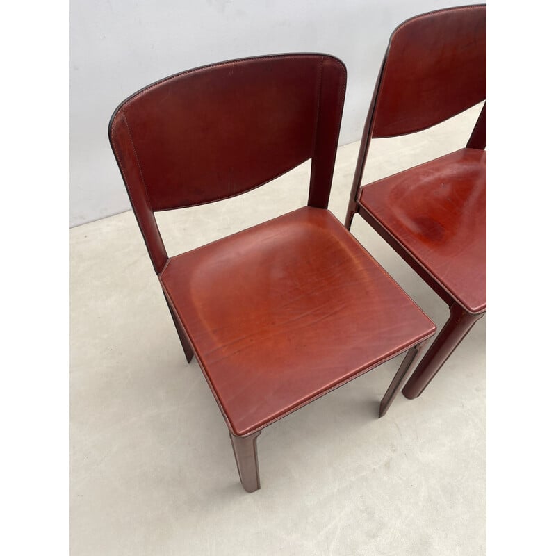 Ensemble de 8 chaises vintage en cuir rouge modèle "Sistina Saddle" par Tito Agnoli pour Matteo Grassi, Italie 1980