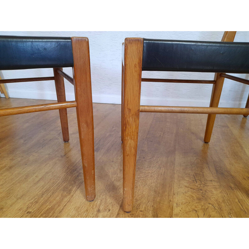 4 Scandinavische vintage stoelen in leer en eik