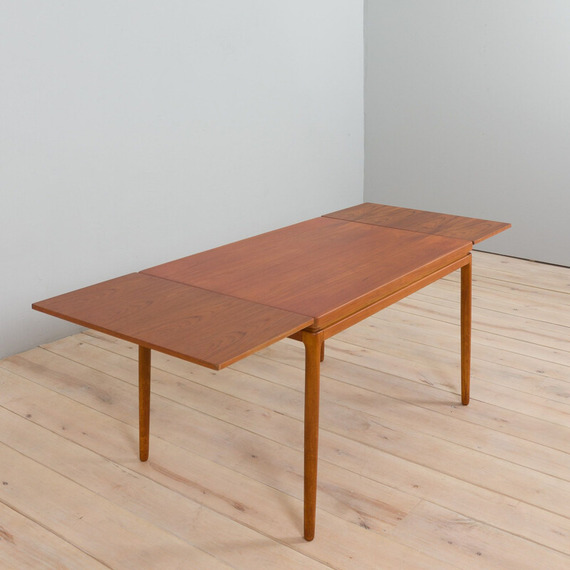 Mesa de teca rectangular Vintage com 2 extensões escondidas por Henning Kjaernulf, Dinamarca 1960