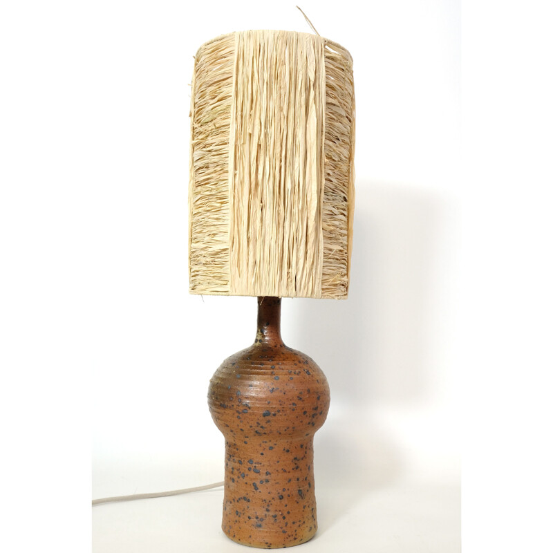 Vintage lamp in red stoneware and its shade in raffia