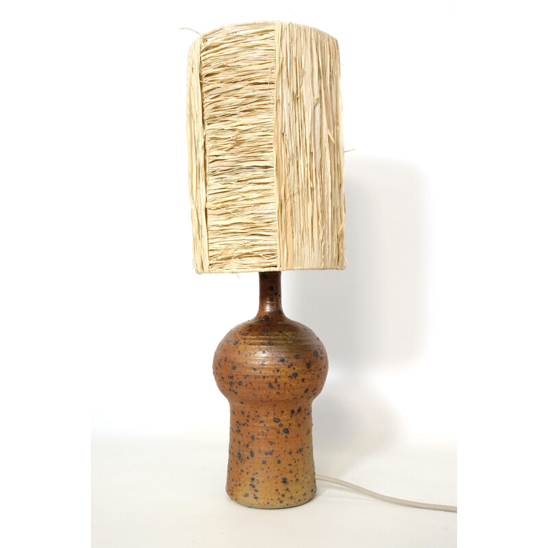 Vintage lamp in red stoneware and its shade in raffia