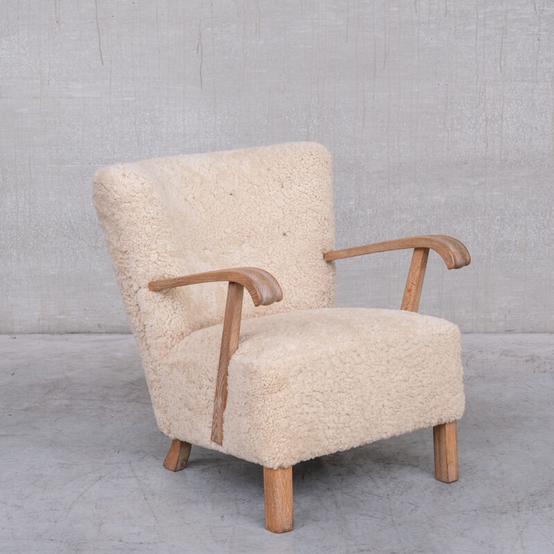 Pair of sheepskin swedish mid-century armchairs