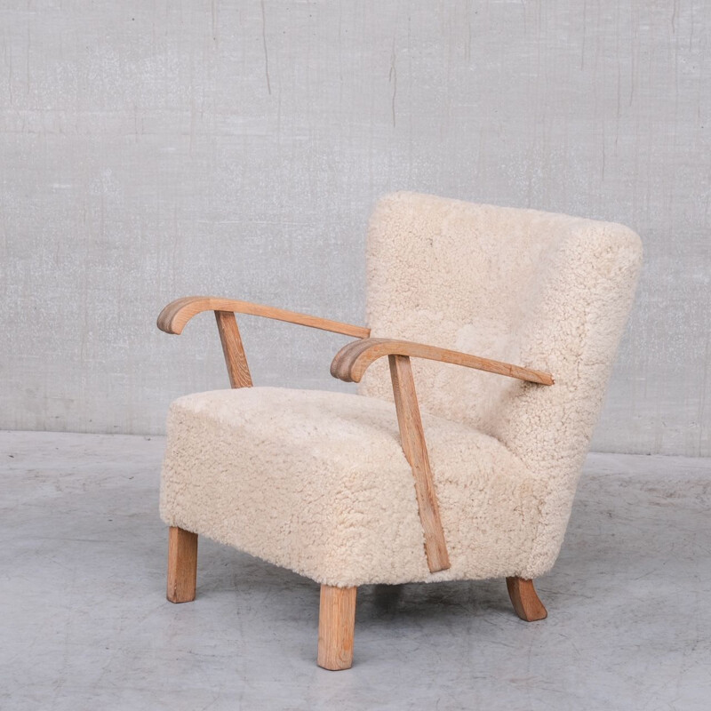 Pair of sheepskin swedish mid-century armchairs