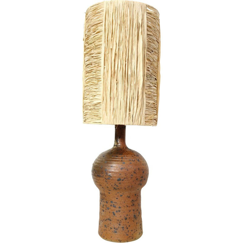 Vintage lamp in red stoneware and its shade in raffia